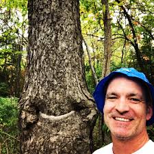 In Weaselhead Natural Area: A smiley face tree trunk