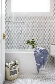 It makes so beautiful color combination inspired from this image. San Francisco White Hexagon Tile Bathroom Transitional With Black Cabinets General Contractors And