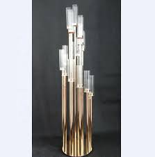 Love candle holders and candelabra? 58 Inch Sixteen Arms Tall Candelabra Candle Holder Gold Metal Wedding Table Centerpieces Decoration Buy Gold Candelabra Centerpieces Candelabra Table Decoration Table Candelabra Centerpieces Product On Alibaba Com