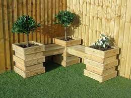 Pin By Lucy Campos On Muebles Y Bancas De Todo Tipo Wooden Garden Benches Deck Planters Garden Seating Area