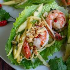 Packed with refreshing pineapple and crunchy peanuts, peppers, carrots, jicama and coconut all doused with the most amazing silky peanut coconut dressing that i could drink by itself! Thai Shrimp Mango Salad Healthy World Cuisine