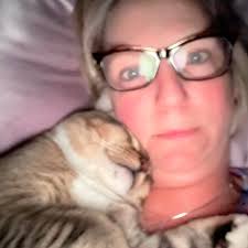 Will it rain during my visit to Cayman Islands?