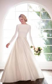 Wedding dresses with sleeves were once the gold (and only!) standard for wedding gowns. Pros And Cons Of Long Sleeve Wedding Dresses Pretty Happy Love Wedding Blog Essense Designs Wedding Dresses
