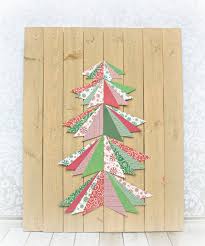 Marvel at the beauty of local original art. Simple Wall Paper Christmas Tree Art On A Wood Pallet