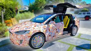 Get tickets today to see me live in concert!!. My New Tesla Car Covered In My Face Epic Youtube