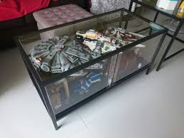 A glass coffee table makes for an elegant, subtle addition to the room, while a coffee table with storage is perfect for creating space for a striking prefer to make a statement? Lego Millennium Falcon Display Coffee Table Off 57