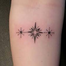 21 Amazing Star Tattoos And Ideas For Women Stayglam Star Tattoo Designs Star Tattoos North Star Tattoos