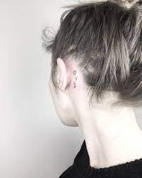 Tiny Black Tulip Tattoo Behind The Left Ear Behind Ear Tattoos Tulip Tattoo Flower Tattoo Ear