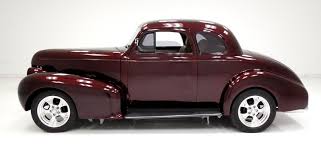 Image result for Trojan Maroon 1939 Oldsmobile