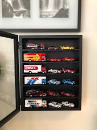 This display is actually a front loading shadow box that i. The New Display Case 22 Michael S Set With Some Freshly Cracked Transports Can T Wait For The Next Nissan Team Transport In The Next Wave For The Top Row Hotwheels