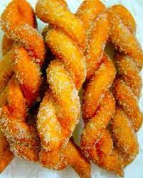 These Treats Are Filipino Donuts That Are Twisted And Then Rolled In Sugar Enjoy Them As A Dessert Snack Or Filipino Bread Recipe Food Filipino Food Dessert