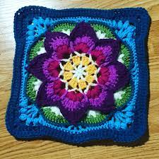 The variety of stitches in autumn colors will definitely put you in a festive mood. Lotus Moon Cal Pattern By Polly Plum Crochet Crochet Crafts Crochet Squares