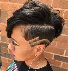 Shaved sides and long top layers make for a bouncy, fresh look. Women S Undercut With Shaved Lines Short Hair Styles African American Shaved Side Hairstyles Undercut Hairstyles