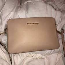 24 drop.chain strap can doubled for shoulder straps.flap top with ysl medallion; Michael Kors Bags Jet Set Large Saffiano Leather Crossbody Poshmark