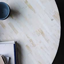 Due to the natural materials used, tile coloring ranges from bright white to light tan. Origami Coffee Table