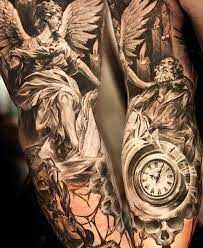 Men place this black or grey guardian angel tattoo on their upper or forearm. Angel Tattoos For Men We Need Fun