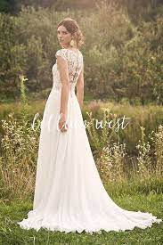 Style 66132 Chiffon Skirt A Line Dress With Empire Waist And Cap Sleeves Lillian West Lillian West Wedding Dress Lace Top Wedding Dress Winter Wedding Dress Styles