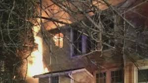 Bedford police officers recall trying to save family from burning home