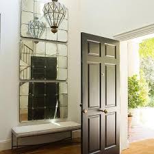 A mirror is an object that reflects an image. Stacked Foyer Mirrors Design Ideas