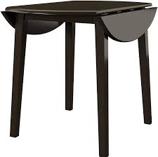 A rectangular drop leaf dining table would be an awesome choice for big families, cookouts, or holiday suppers. Amazon Com Signature Design By Ashley Hammis Round Dining Room Drop Leaf Table Dark Brown Tables