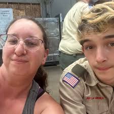 Diapering a baby goat for indoor roaming