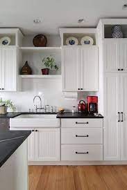 We are planning/shopping having our kitchen refinished and want to address the space above our 42 cabinets. Design Dilemma What To Do With The Space Above My Kitchen Cabinets