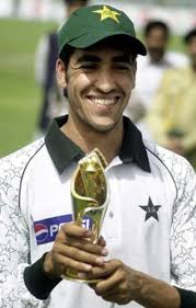Umar Gul smiles proudly with the Man of the Match trophy