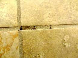 How To Quickly Repair Cracks In Tile Grout Tile Grout Diy Kitchen Flooring Tile Repair
