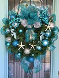 Famoby sea shells mixed beach seashells starfish for beach theme party wedding decorations diy crafts candle making fish tank vase fillers home decorations supplies 70+ pcs 4.2 out of 5 stars 1,839 $11.99 $ 11. 680 Holiday Christmas Coastal Ideas In 2021 Coastal Christmas Beachy Christmas Beach Christmas