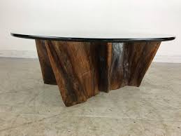 This pure form has been created from a single sheet. Unusual Organic Cyprus Root And Glass Coffee Table For Sale At 1stdibs