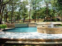 2 Tier Retaining Wall Ideas Retainingwallideas Pool Landscaping Stone Pool Natural Swimming Pool