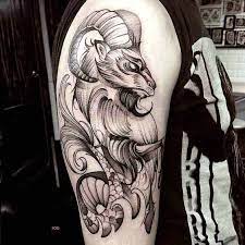 Instead of getting two or more tattoos for your arm, get. Tribal Capricorn Tattoos For Guys Novocom Top