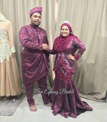 Baju pengantin ungu dan maroon. Facebook
