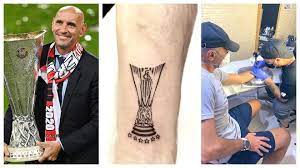 Schedule your appointment with mike view mike's online portfolio. Sevilla Monchi Gets Tattoo Of The Europa League Trophy On His Forearm Marca