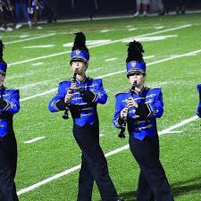 A marching band is a group of instrumental musicians who perform while marching, often for entertainment or competition. 10 Essential Marching Band Instruments Every Band Needs