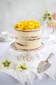 Birthday Cake Flavours List With Images This Beautiful Vegan Tropical Celebration Cake Is Filled With Vegan Mango Curd Passion Fruit Flavou Passion Fruit Cake Vegan Birthday Cake Wedding Cake Recipe