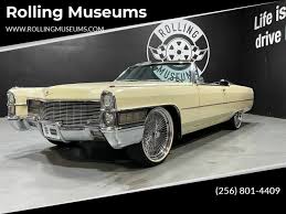 Image result for Starlight Silver 1965 Cadillac