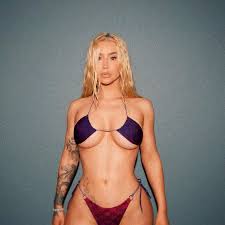 Iggy Azalea says she 'likes her boobs' and won't apologise for ...