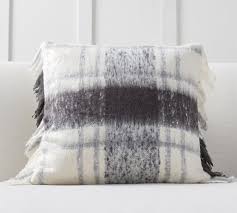 Cushion covers can be removed and thrown in washer. Dagny Plaid Mohair Pillow Cover Pottery Barn