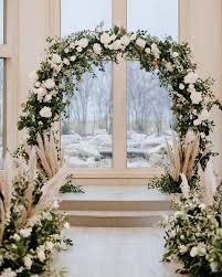 Lush Floral Arch At A Winter Wedding In Texas Wedding Arch Rental Arch Decoration Wedding Wedding Photo Walls