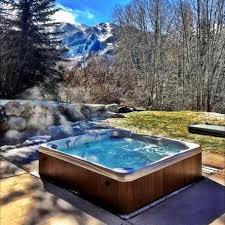 It's exactly what it sounds like—a bathtub in your backyard. Outdoor Hot Tub Landscaping Ideas To Integrate Your Home Spa Seamlessly Hot Spring Spas