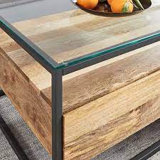 Our box frame coffee table's airy base and sleek marble top add instant glam to your living room. Box Frame Storage Coffee Table