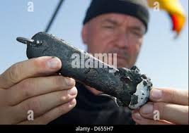 The photo shows a German Junkers Ju 52 transport aircraft with the  paintwork of the German Condor Legion loaded with Moroccan soldiers