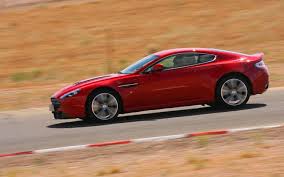 Image result for Magma Red 2011 Aston Martin