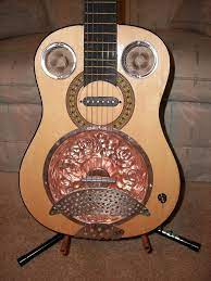 Another Resonator Conversion Using A Bundt Pan A Strainer Head And A Couple Of Drain Strainers For The Soundhole Guitar Design Guitar Art Resonator Guitar