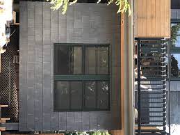 Smart Homeowner Installed Slate Siding A New Trend In Commercial And Residential Slate Has Proven Itself To Slate Cladding Red Brick Exteriors Exterior Brick
