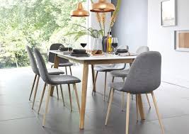 Light Blonde Wood Table With Grey And Green Upholstered Chairs In Scandinavian Inspired Dining Room Green Upholstered Chair Home Chair Cushions