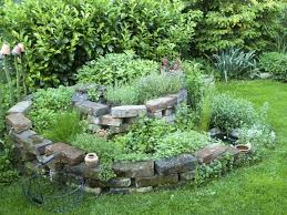 Herbs add a texture, feel and scent to a room or a garden that is unlike any other plant. How To Plant Spiral Herbal Gardens Correctly List With Suitable Plants And Planting Plans My Desired Home Spiral Garden Herb Garden Design Herb Spiral