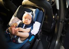 Positioning A Baby With A Newborn Car Seat Insert And Headrest