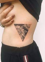 Blackout Sunflower Triangle Rib Tattoo Rib Tattoo Tattoos Sunflower Tattoos
